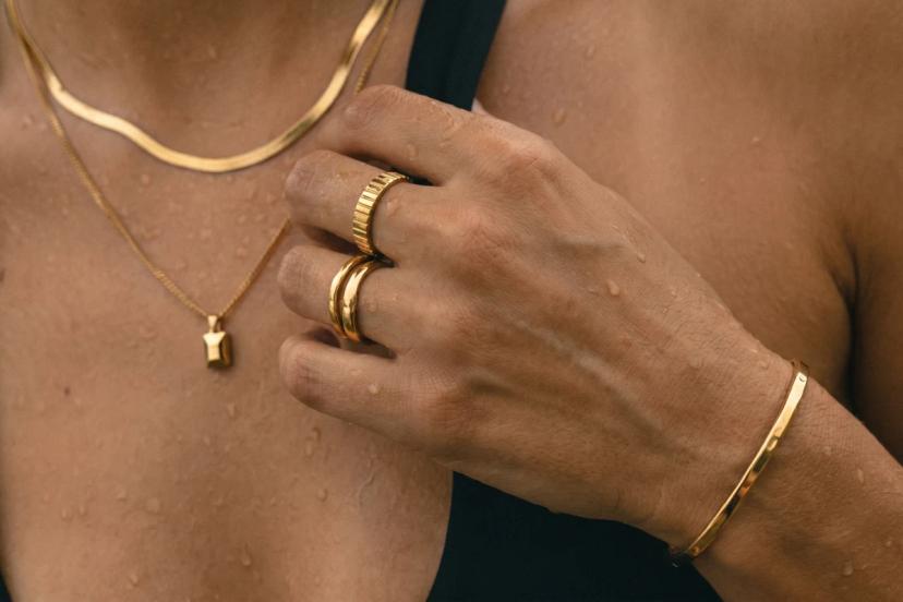 PVD gold stainless steel jewelry with water droplets for daily water resistance