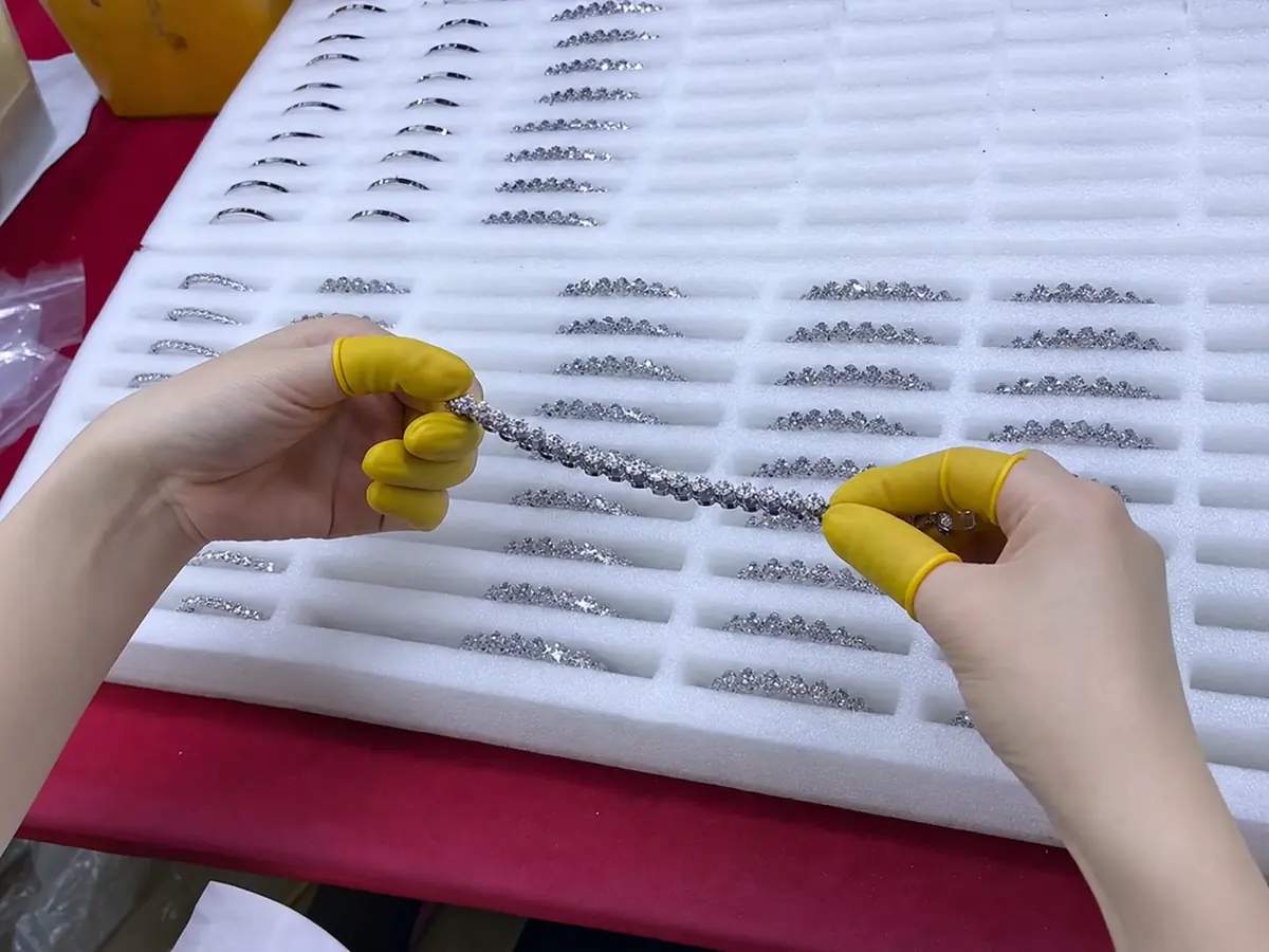 moissanite tennis bracelet stone alignment and setting inspection