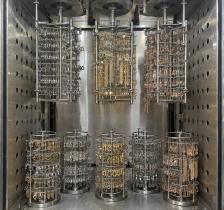 Stainless steel jewelry inside a PVD vacuum coating chamber