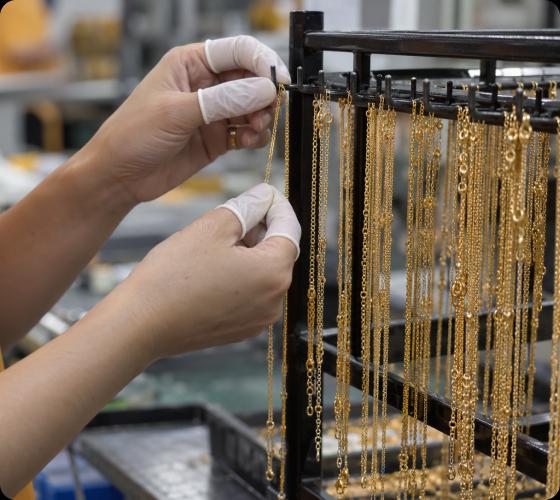 Finished PVD gold stainless steel jewelry inspected in production